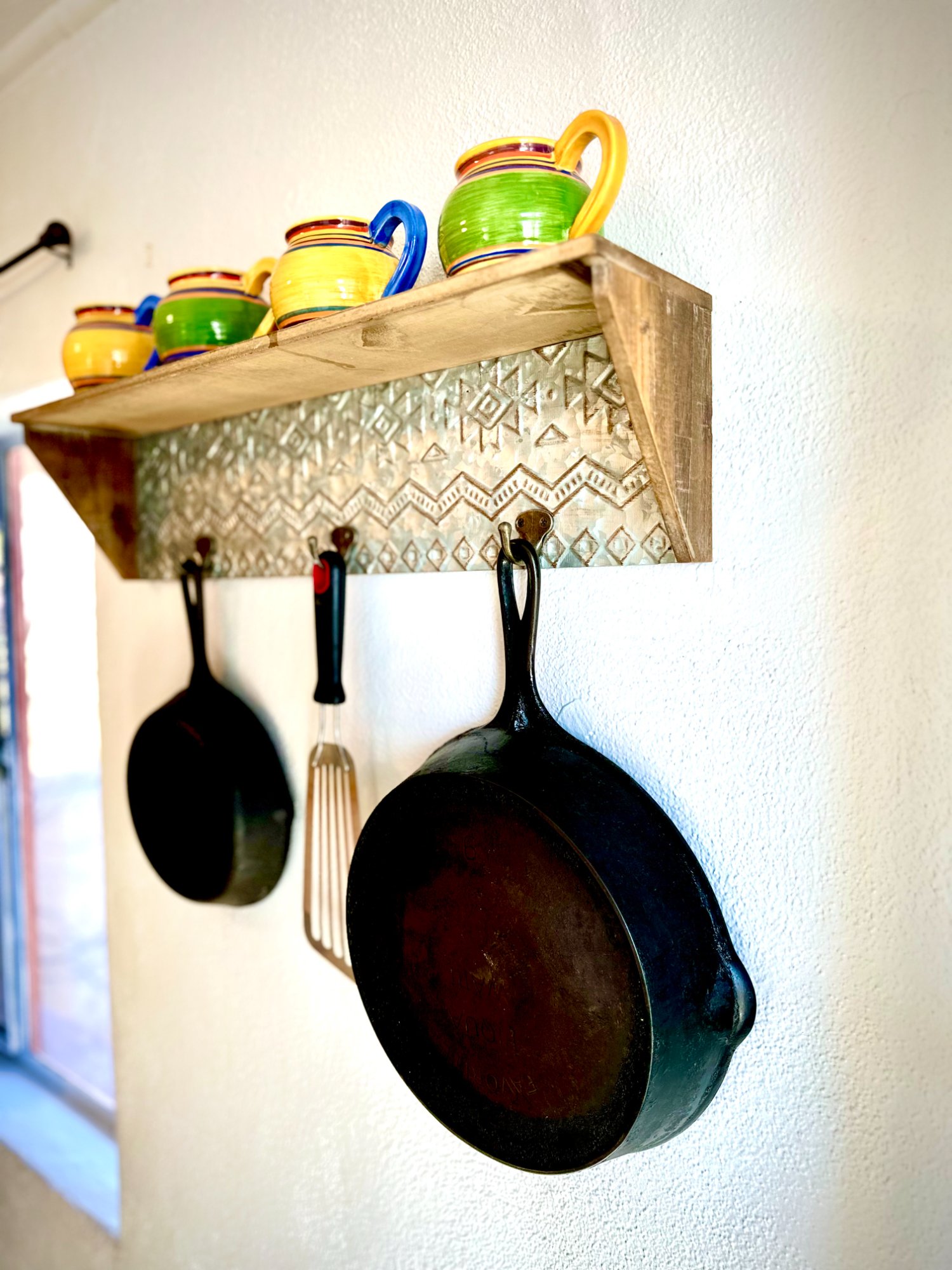 Cast iron skillet rack with Talavera pottery
