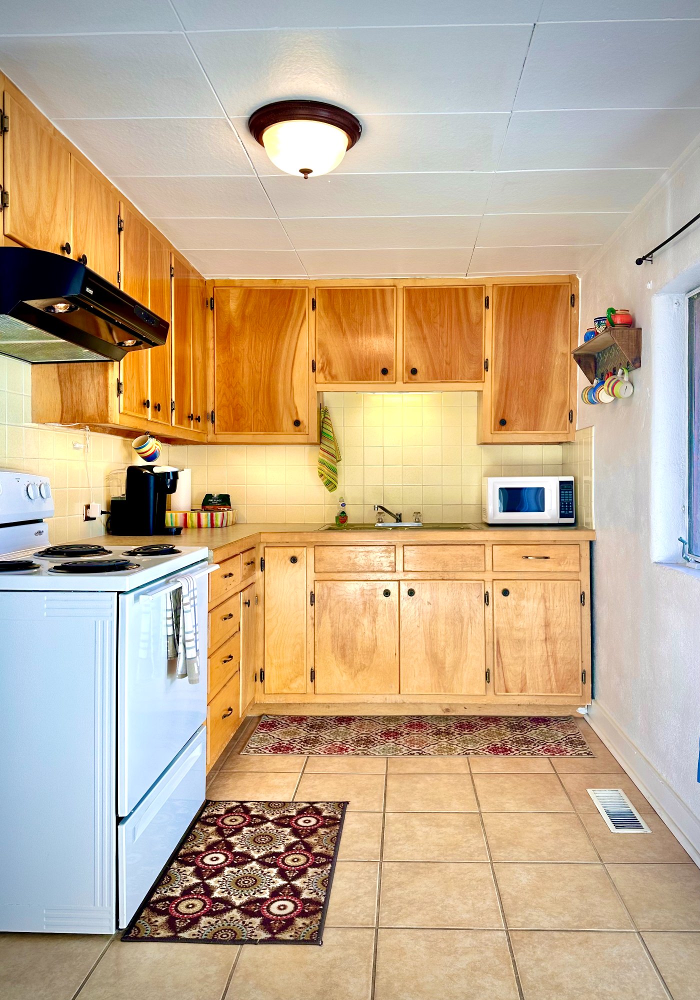 Kitchen with warm wood cabinets