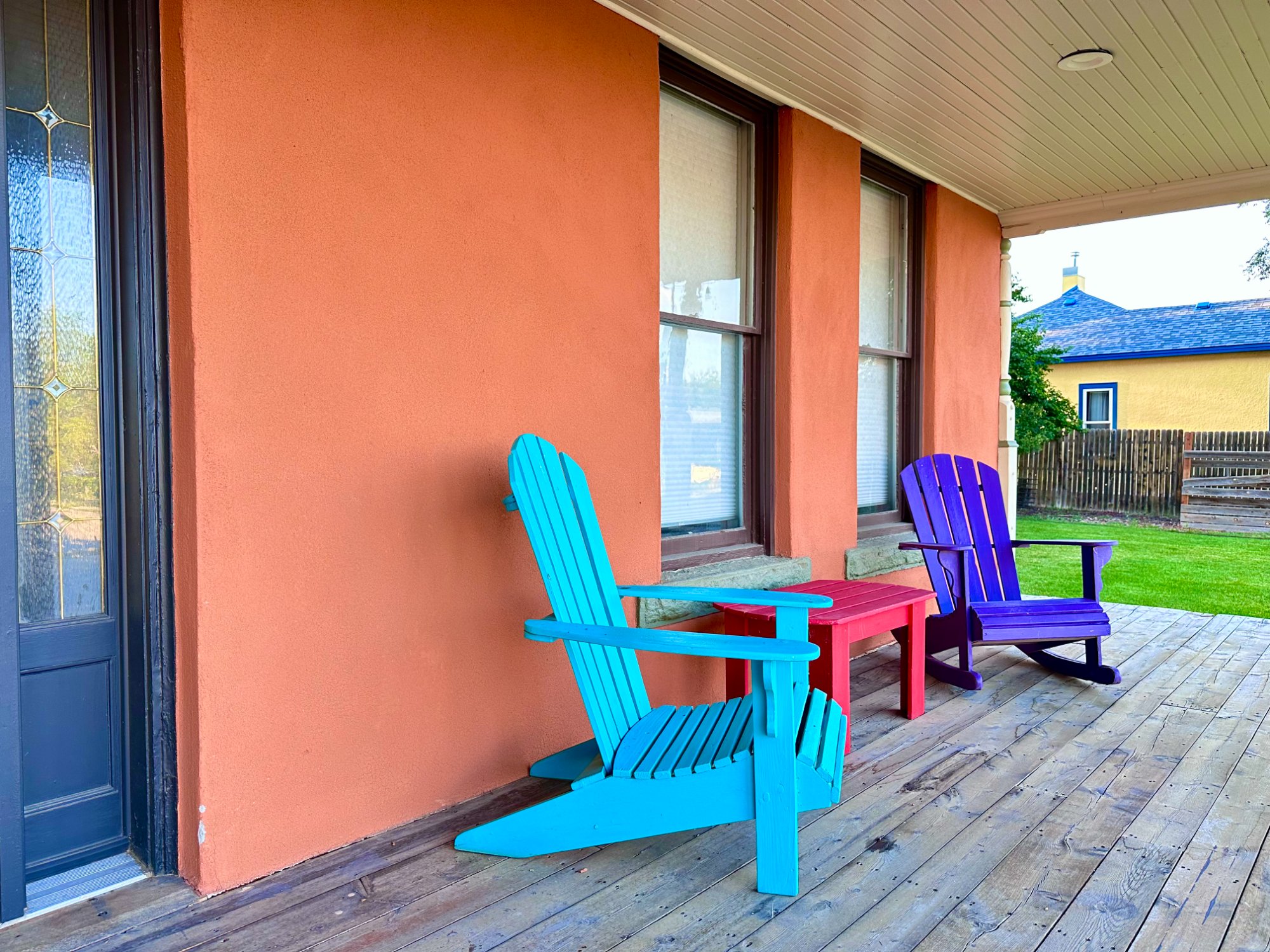 Gallery House front porch with Adirondack chairs