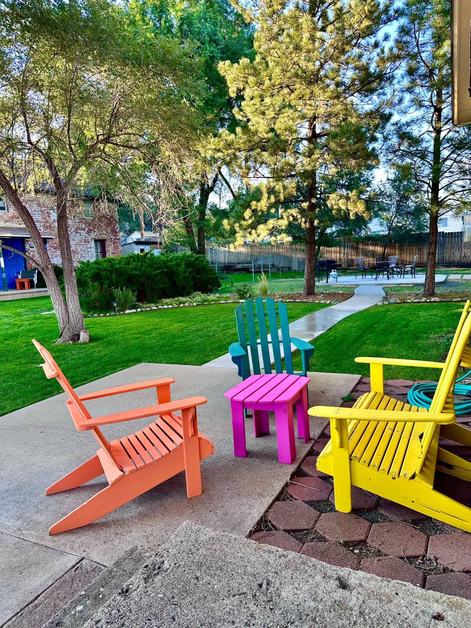 Shared campus yard with colorful chairs