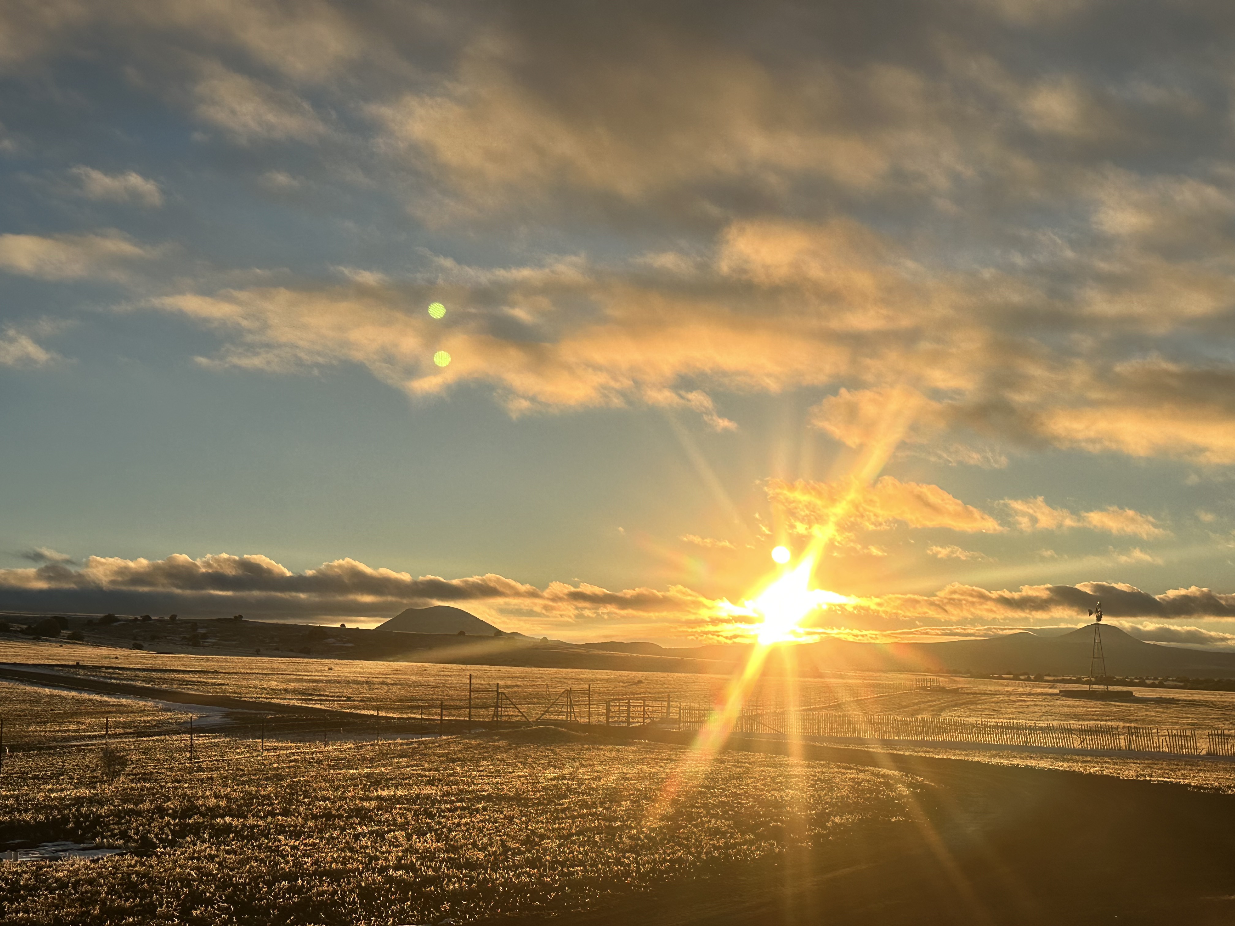 Sunrise over the ranch at Capulin Volcano View House